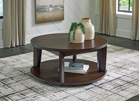 Tampa Furniture Outlet - Ashley Furniture - Korestone 2 Coffee Table - Round Cocktail Table / Dark Brown - T657-8