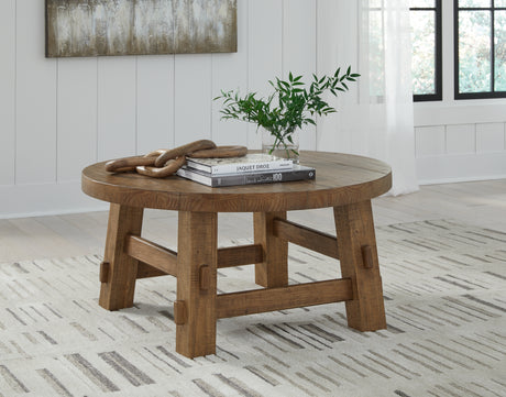 Tampa Furniture Outlet - Ashley Furniture - Mackifeld Coffee Table - Round Cocktail Table / Warm Brown - T724-8