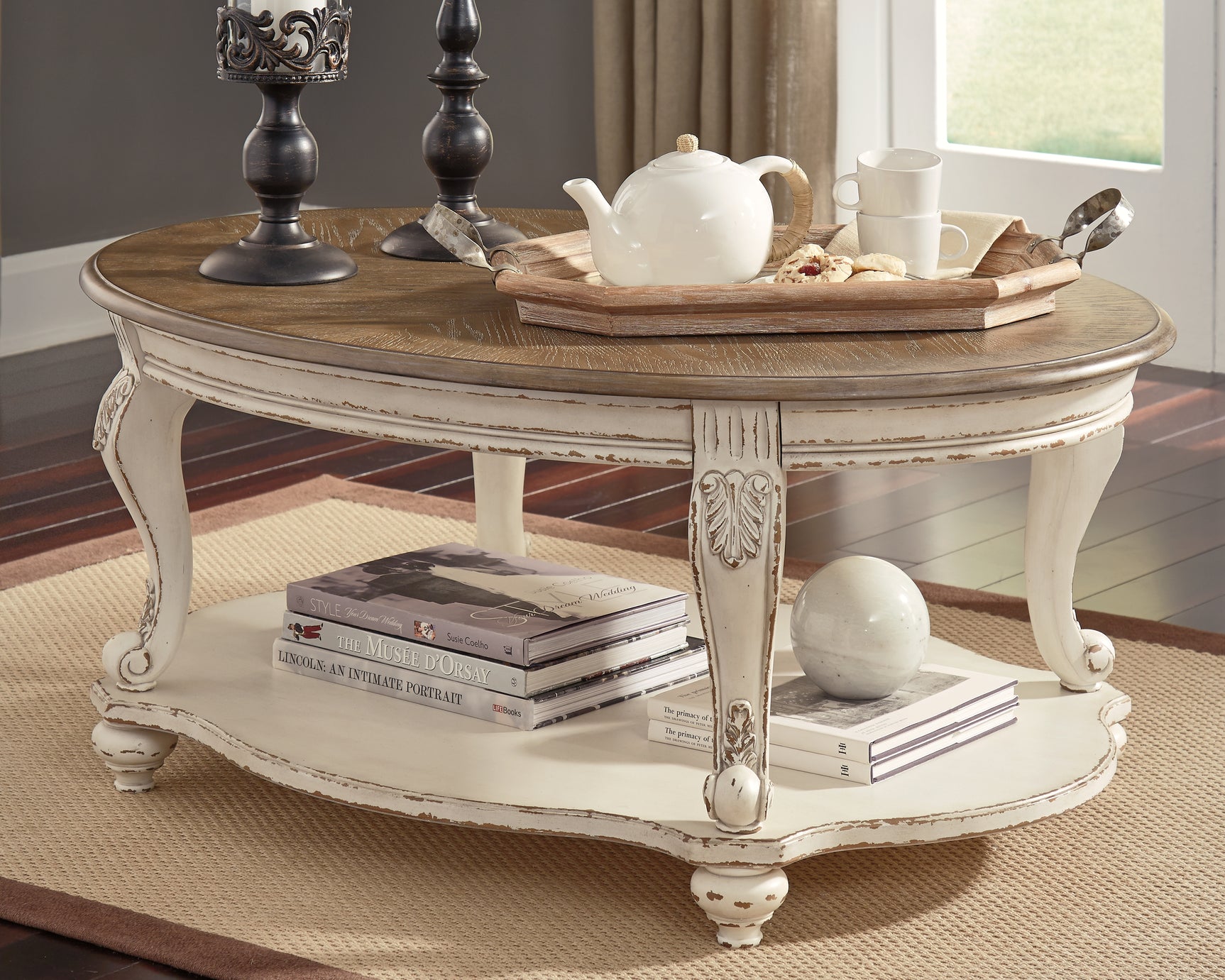 Realyn Coffee Table - Tampa Furniture Outlet