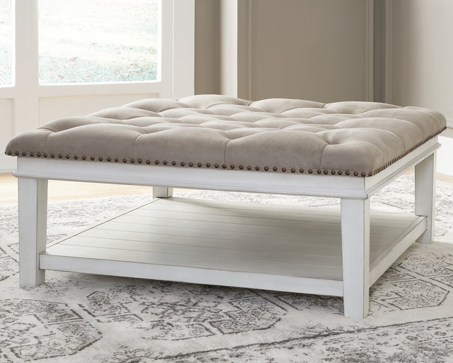 Tampa Furniture Outlet - Ashley Furniture - Kanwyn Upholstered Ottoman Coffee Table - UPH Ottoman Cocktail Table / Whitewash - T937-21