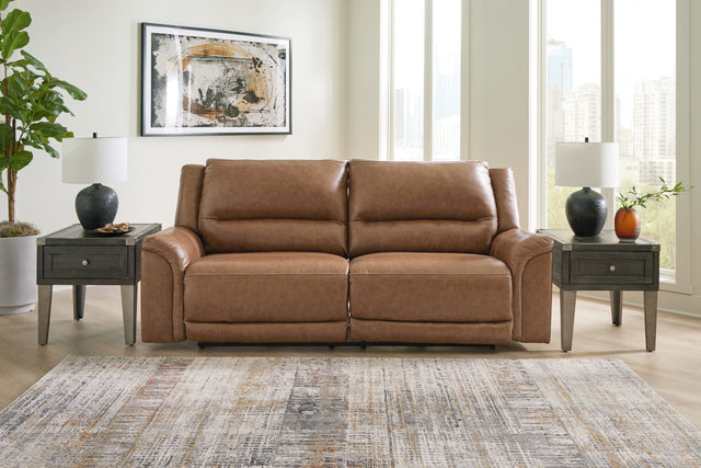 Tampa Furniture Outlet - Ashley Furniture - Trasimeno Living Room - 2 Seat PWR REC Sofa ADJ HDREST / Caramel - U8281547